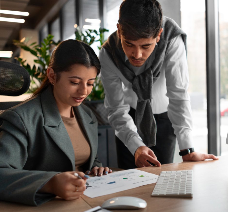 Professional reviewing financial information and bookkeeping data on a laptop